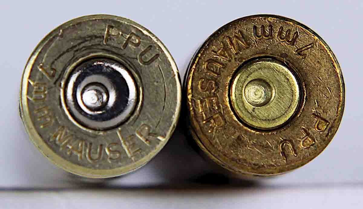 The factory load primer showed some flattening (right), a sign of excessive headspace. A reduced load fired primer (left) appears normal.